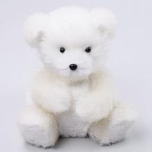 Bílý sedící medvěd