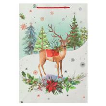 Dárková taška s vánočním motivem a glitrem.