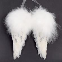 Bílá andělská křídla s peřím