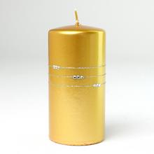 Zlatá vánoční svíčka s pruhy