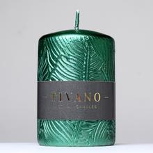 Zelená vánoční svíčka TIVANO s ornamentem.