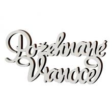 Bílé výřezy s nápisem Požehnané Vánoce.