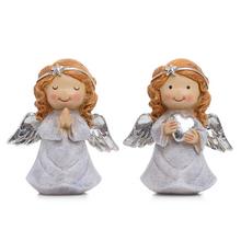 Dekorační anděl v modlící pozici se srdcem.