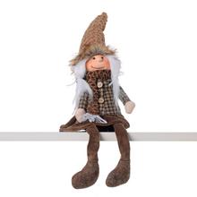 Hnědý textilní skřítek v sukni s dlouhýma nohama.