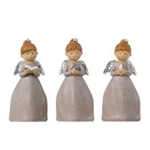 Sada tří dekorativních andělů s knihou, svíčkou a křížem.