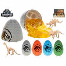 Dinosaurí vejce se slizem a kostrou dinosaura.