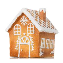 Keramický perníkový domek s bílou polevou.