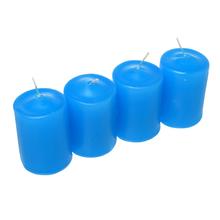 Adventní svíčky v tyrkysovo-modré barvě.