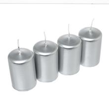 Sada čtyř stříbrných adventních svíček.
