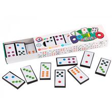 Klasické domino v krabičce s barevnými kameny.