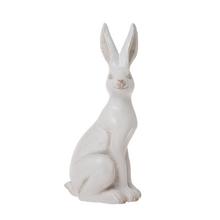 Bílý keramický zajíček s výškou 29,5 cm.