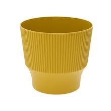 Kulatý designový obal na květiny v limetkové barvě.