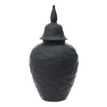 Černá keramická dóza s poklopem.