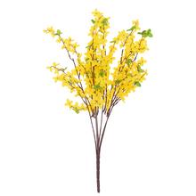 Kytice zlatého deště v žluté barvě, umělé květy.