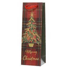 Vánoční papírová taška s motivem stromečku a nápisem Merry Christmas.