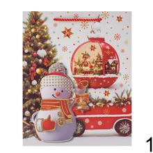 Dárková taška s vánočními motivy a glitrem.