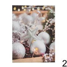 Dárková taška s vánočním motivem a glitry.