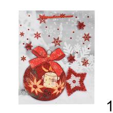 Vánoční dárková taška s glitry a motivem Mikuláše.