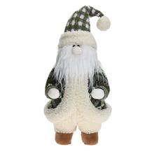 Stojící Santa Klaus v bílo-zeleném oblečení s dlouhými bílými vlasy.