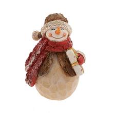 Sněhulák s dárkem v béžové a červené barvě.