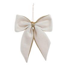 Závěsná mašle v šampaňském odstínu.