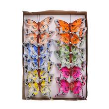 Barevní motýli na klipu v balení po 12 kusech.