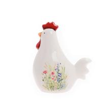 Bílý kohout s květinovým vzorem.