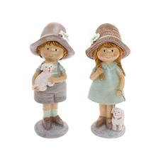 Dětské figurky chlapce a dívky se psíkem.