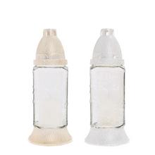 Hrobové svíčky v čirém skle srdce.