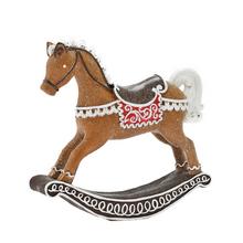 Perníkový houpací kůň s dekoracemi.