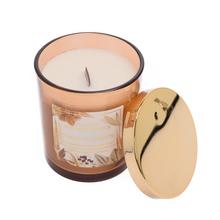 Vonná svíčka Good Moments ve skleněném obalu.