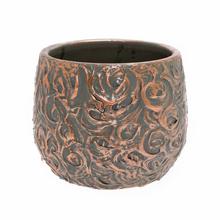 Obal Arthur v zeleno-terakotové barvě.