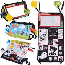 Skládací senzorická hračka se zrcadlem a kontrastní knihou.