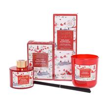 Sada vonných svíček s vánoční tématikou.