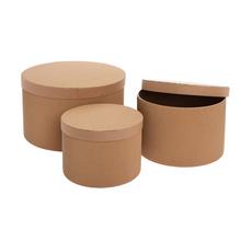Sada kulatých hnědých krabic různých velikostí.