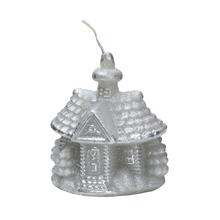 Šedý domek kostela se svíčkou