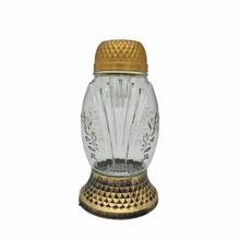 Solární svícen s dekorativním designem, výška 20 cm.