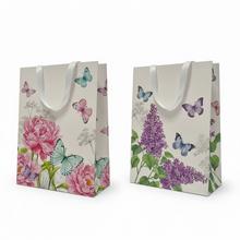 Dárková taška s lučními květy a motýly.